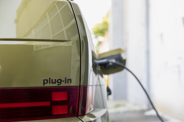 Close_Up_Of_Plug_In_Electric_Vehicle_Charging__Connected_To_Electric_Cable_original_3784610.jpg